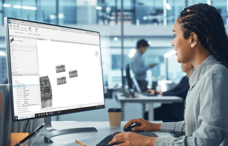 Woman using 3D integration features in Prevu3D interface.