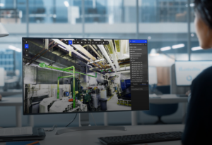 User Analyzing a 3d Facility Scan Using Realityplatform™ Software on a Widescreen Monitor Highlighting Industrial Pipes and Equipment Prevu3d