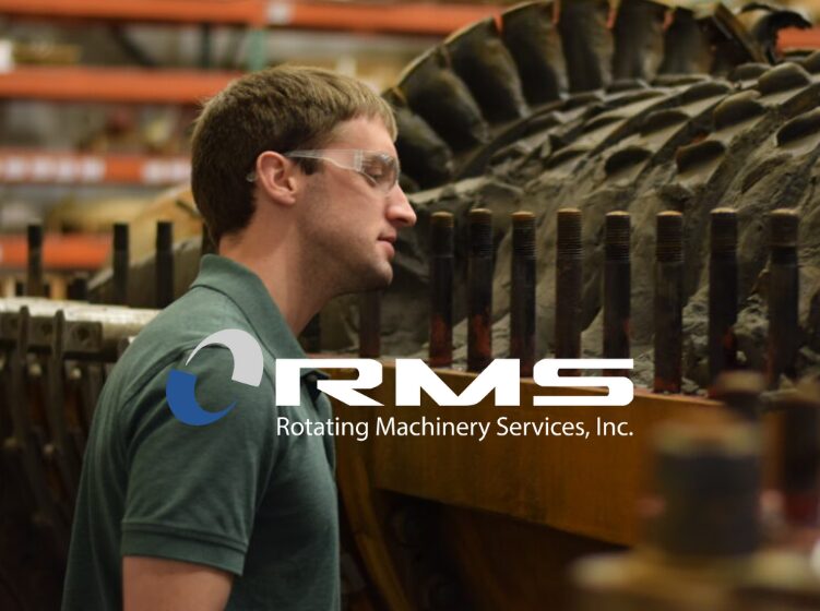 RMS engineer inspecting large industrial machinery.