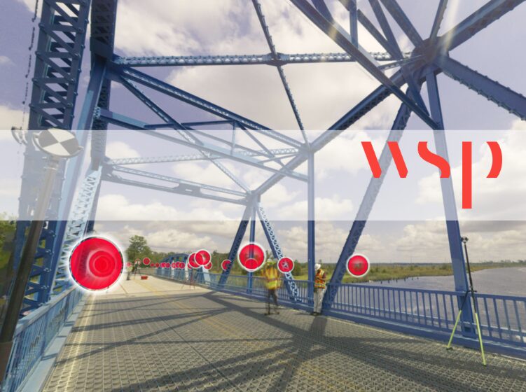 WSP engineer on BlueBridge deck with Leica scanner and Prevu3D scan targets visible during reality capture survey