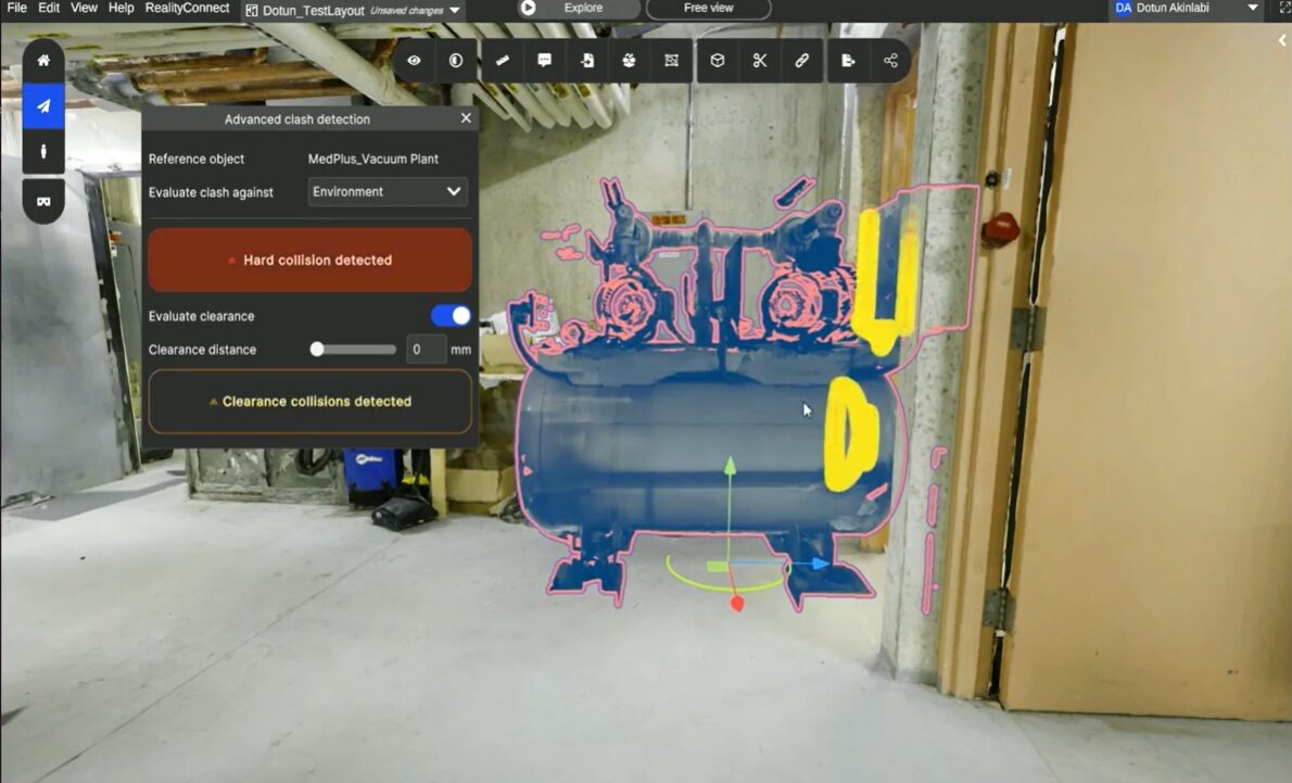 Screen Capture of an Industrial Clash detection Ui over a Workshop Scene with a Blue Tank Highlighted in Pink Outlines and Yellow Annotation Marks Prevu3d